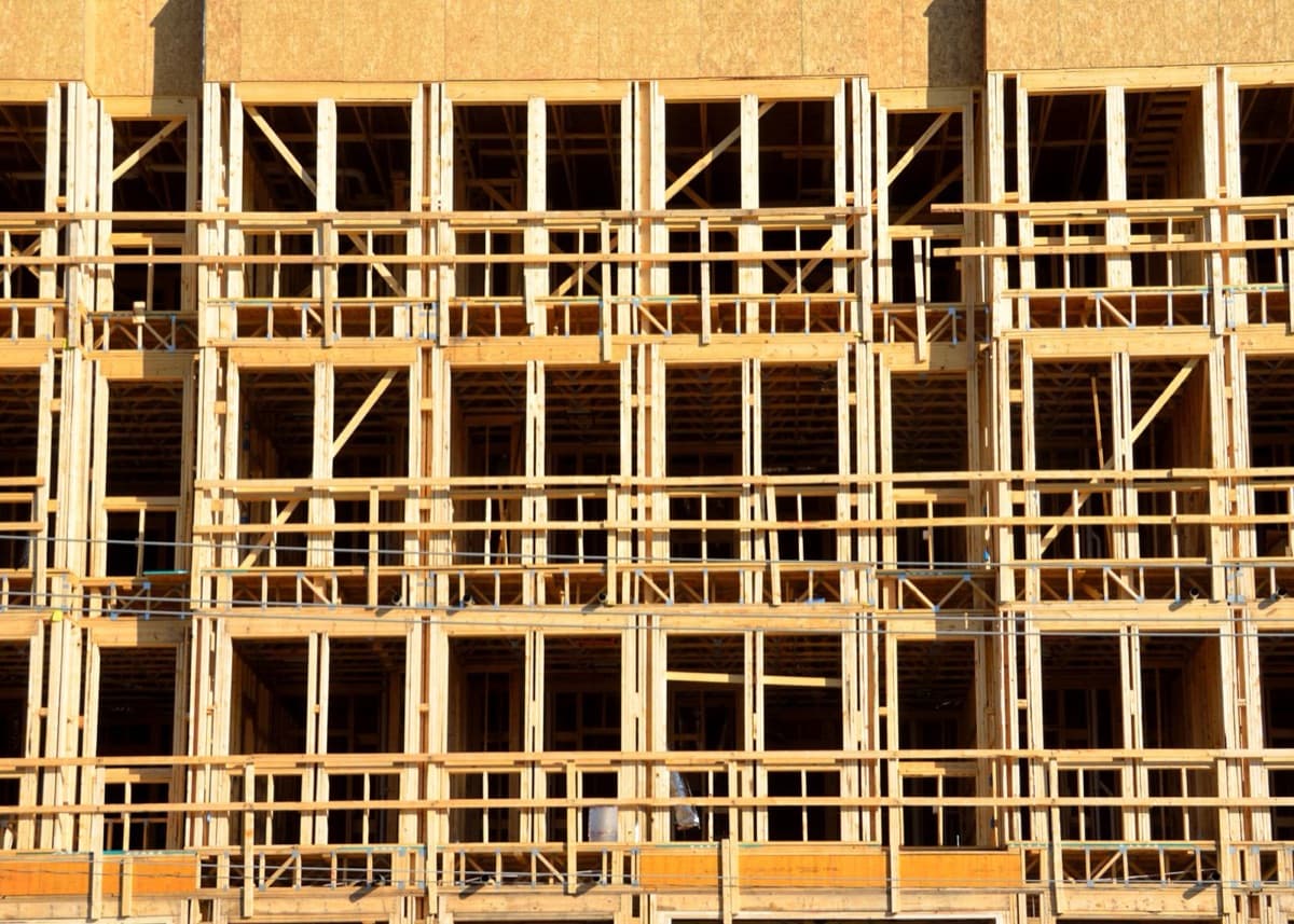 Timber framing of a multi-unit building under construction